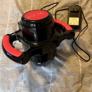Black and Red Massager with AC Adapter